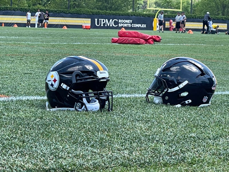 Steelers helmets on the practice field