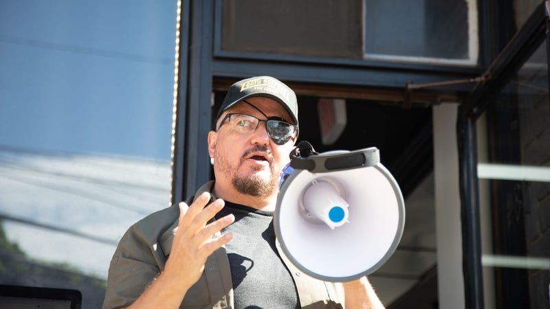 Oath Keeper President Stewart Rhodes speaks at the Casa Di Dolore Tattoo shop in Newburgh.