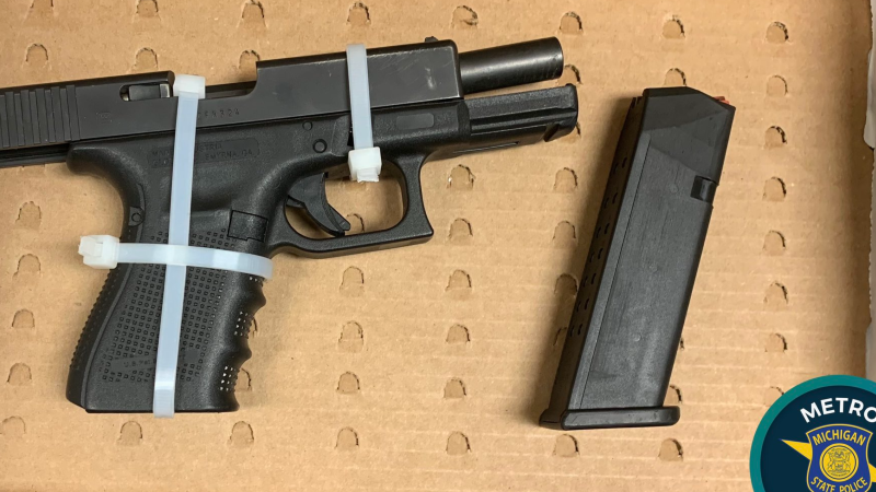 MSP arrest man with stolen gun, bottle of tequila between his legs during traffic stop in Detroit