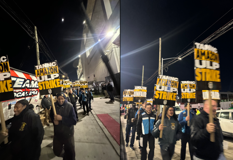 Picket signs outside the Amazon delivery facility in Maspeth on Thursday