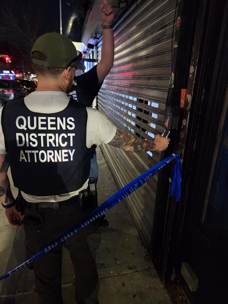 Detectives with the Queens District Attorney's Office padlocked the Green Point Convenience Corp. at 42-18 Greenpoint Ave. in Sunnyside for illegally selling cannabis and charged a woman working there.