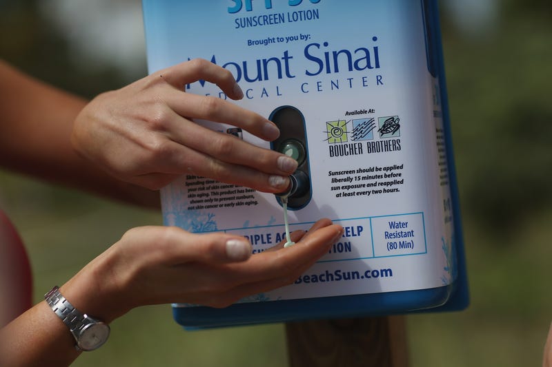 Sunscreen dispenser