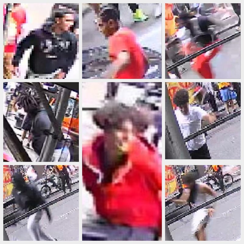 Eight suspects are being sought for smashing an NYPD vehicle at 830 Broadway
