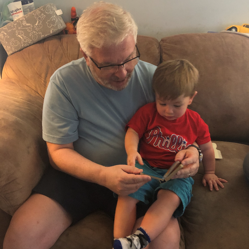 Chuck Swanson with his grandson, the fifth generation of Philadelphia sports fans.