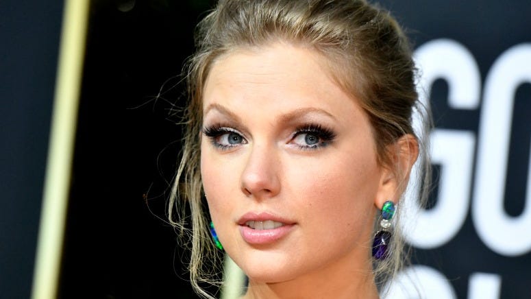 Taylor Swift Reacts to 'Folklore' Breaking Multiple Records