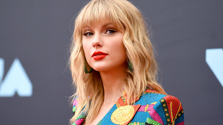 Taylor Swift admits 'Red' is about 'pure, absolute, to the core, heartbreak'