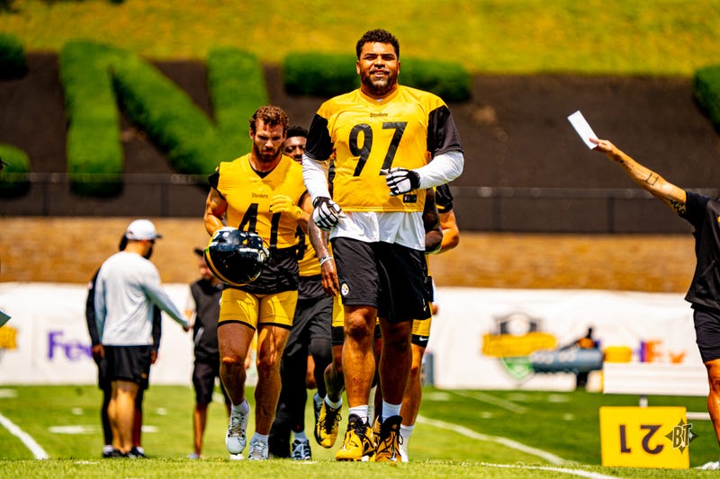 Cam Heyward going through stretching