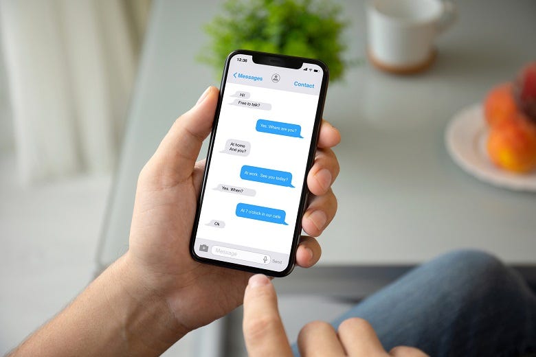 woman reading text messages