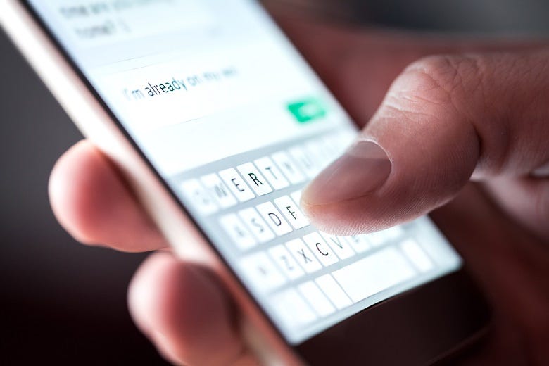 man texting
