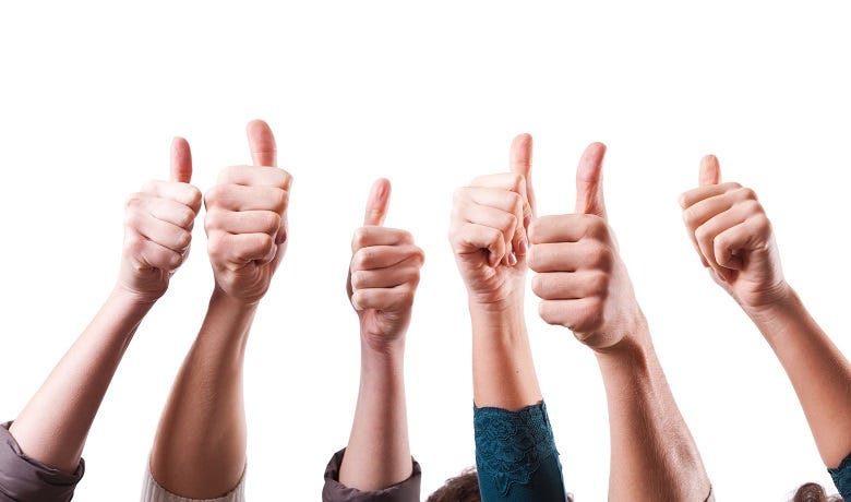 6 thumbs in the air