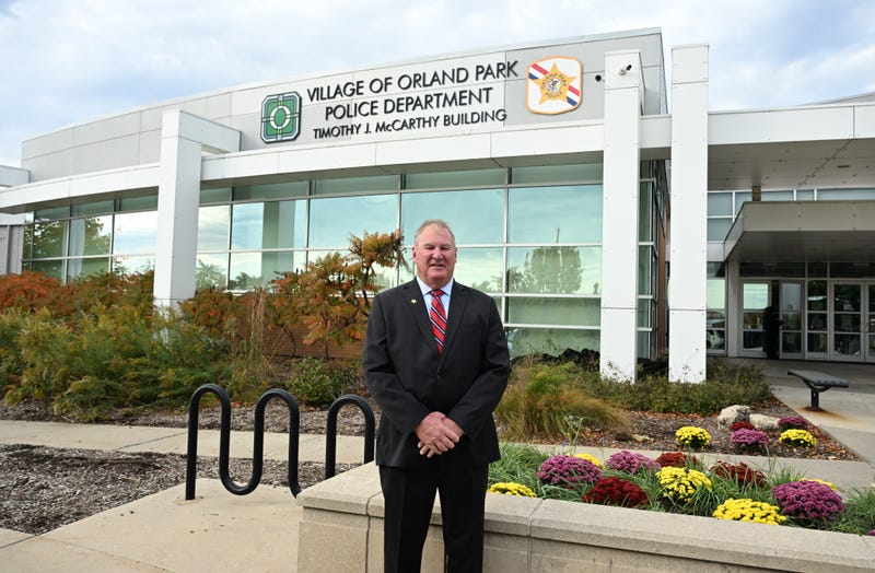Tim McCarthy standing in front of building