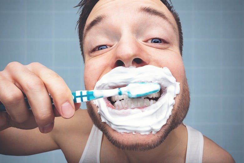 Man brushing teeth 