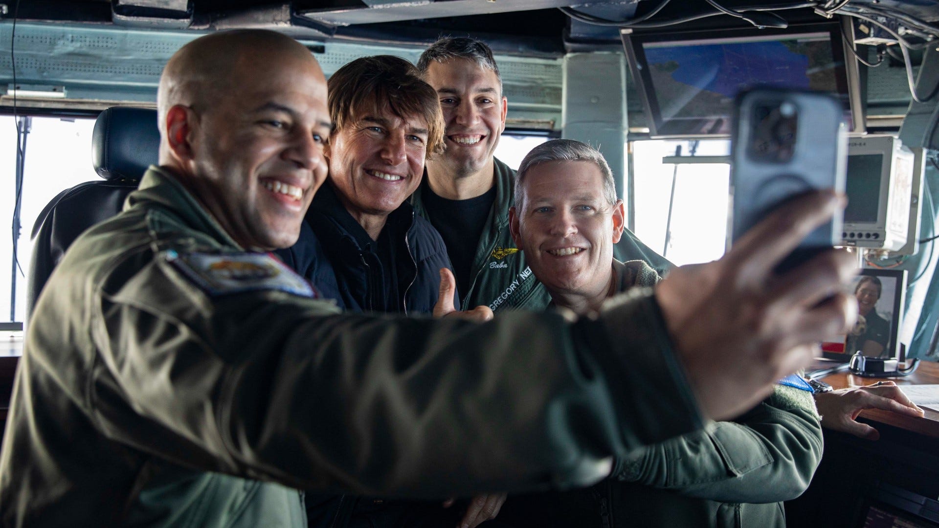 Maverick star Tom Cruise visits Navy aircraft carrier