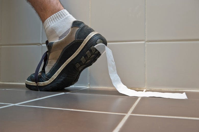Toilet paper stuck to shoe