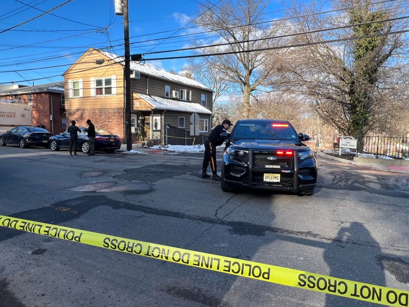 Police investigate after a house fire in Teaneck, New Jersey left multiple people, who were trapped in the basement, injured early Monday morning.
