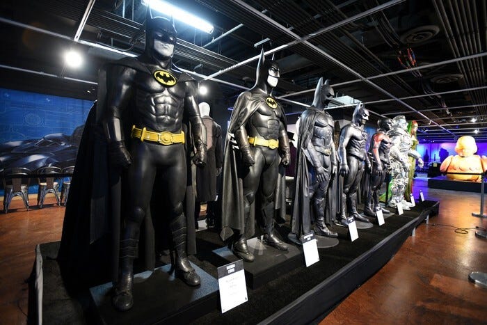 Numerous Batman props, costumes and memorabilia are on display at The Batman Experience Powered by AT&T.