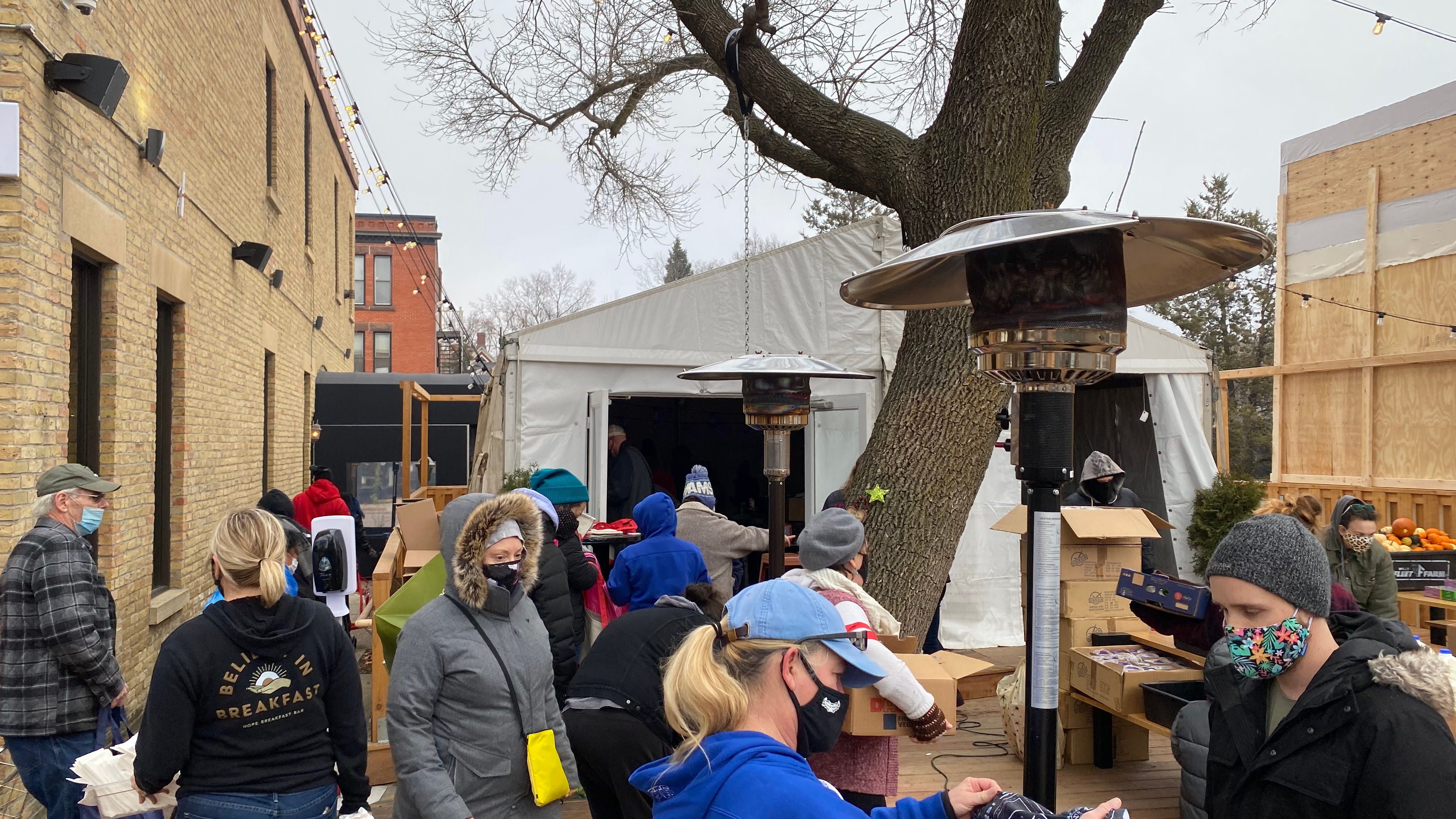 Restaurant owners help give back to their employees with grocery giveaway