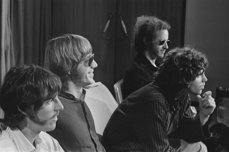  The Doors during a press conference at Heathrow Airport, London in 1968