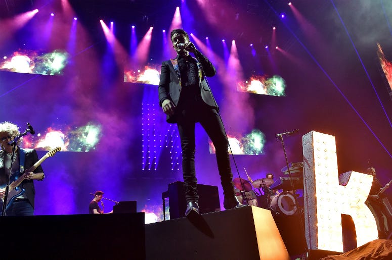 Brandon Flowers of The Killers performs onstage during the grand opening of T-Mobile Arena