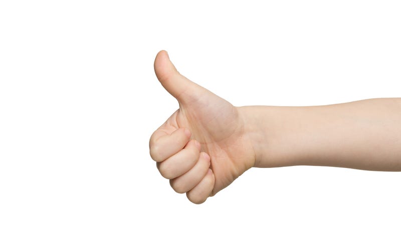 thumbs up child's hand
