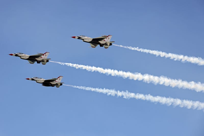 The United States Air Force Thunderbirds fly in formation