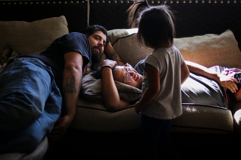 Tiana Antoine and Nathan Drennan relax with their niece. Flathead Indian Reservation, Montana