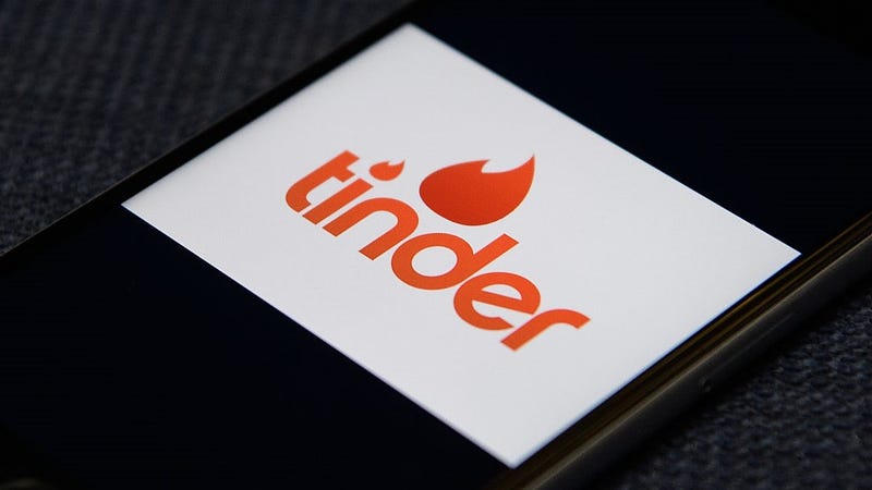  The "Tinder" app logo is seen on a mobile phone screen on November 24, 2016 in London, England. 