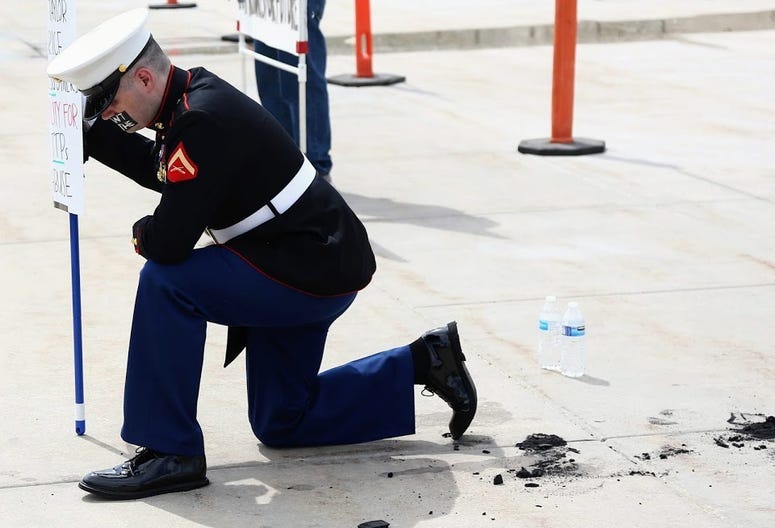 Todd Winn, a Marine veteran, gained national attention after he protested in uniform outside the Utah state capitol for so long his shoes melted to the pavement. 