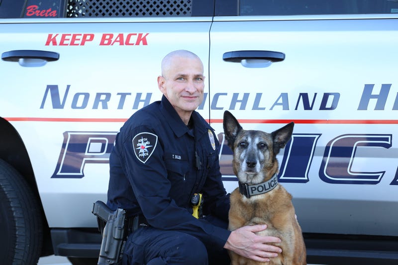 Breta, the first K-9 to serve in the department, continues to be a permanent companion of her longtime handler, NRHPD Officer Tom Bulger.