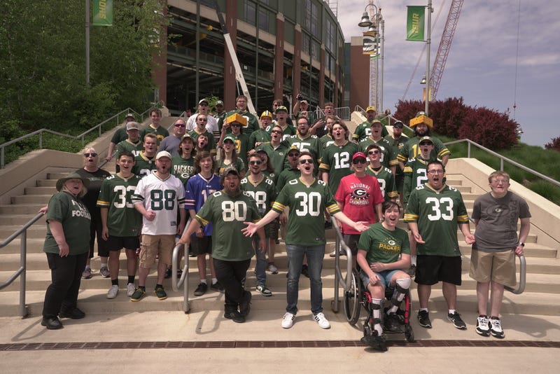 Tom Grossi and fans outside Lambeau Field in Green Bay