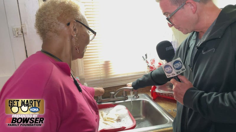 Tonya Todd shows Marty Griffin the hot water she's been without for more than 4 years.