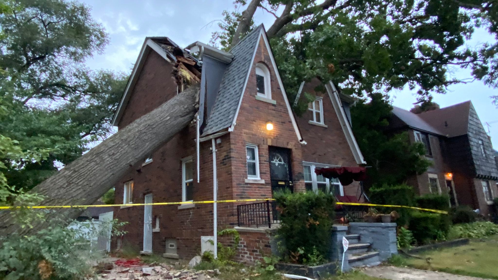 Kids narrowly escape injury after huge tree falls into home in historic Detroit neighborhood