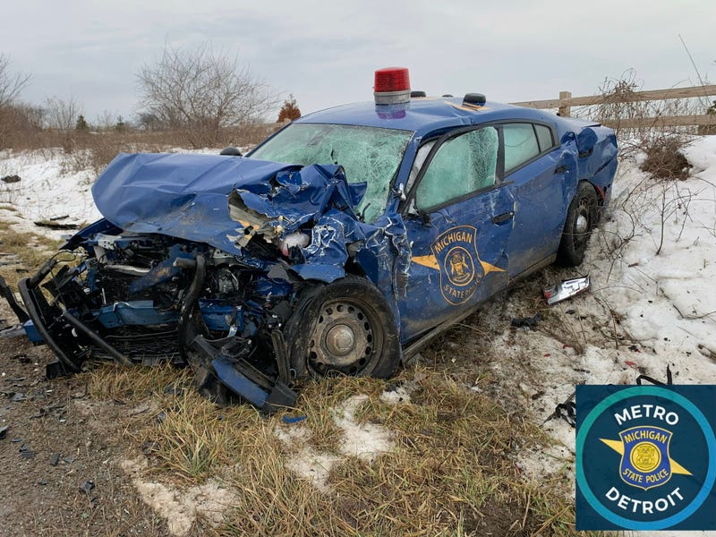 One state trooper was seriously injured following a near head-on collision with another driver in northern Oakland County on Tuesday morning, authorities said.