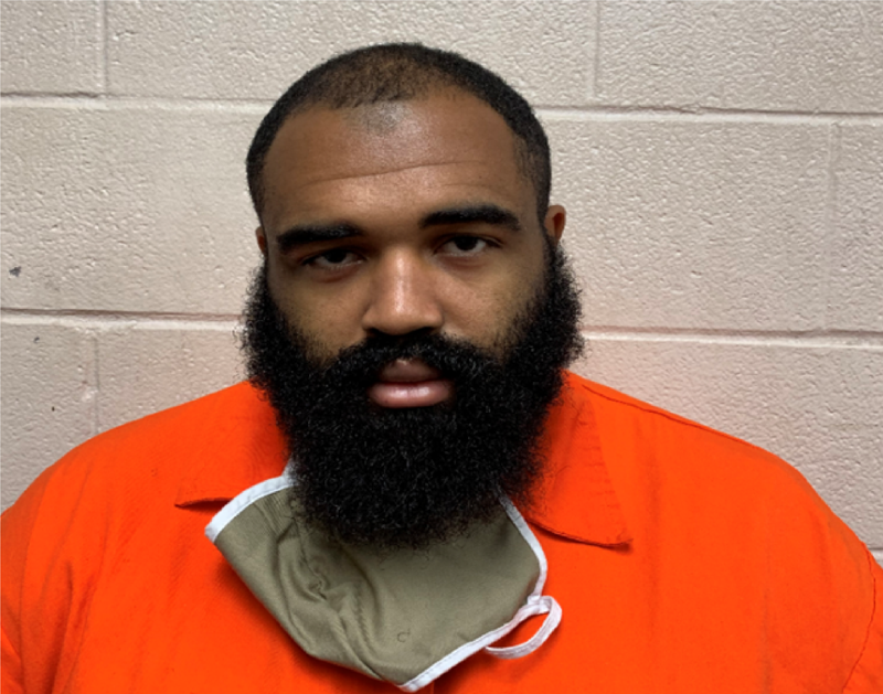 Man charged with crashing vehicle and stealing guns