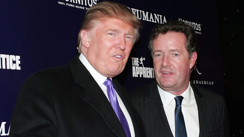 Donald Trump (L) and Piers Morgan celebrate Kim Kardashian's appearance on "The Apprentice" at Provacateur on November 10, 2010 in New York, New York.