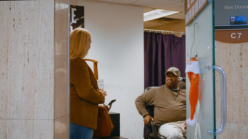 Texas Wants to Know's Baylee Friday talks to Leonard Byrd, who runs a shoe shine business, in Dallas' pedestrian tunnels.