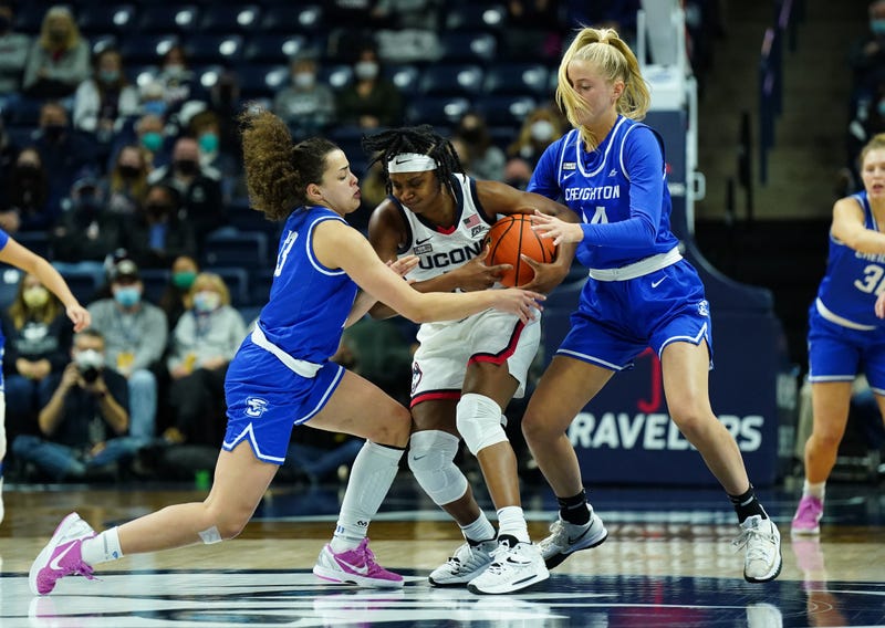 Creighton Bluejays guard Rachael Saunders (13) and forward Mallory Brake (14) defend against UConn Huskies guard Christyn Williams (13) in the second half at Gampel Pavilion