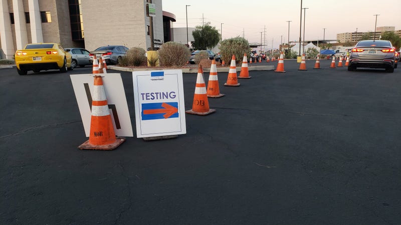 Drivers arrive for a Covid-19 test at UNLV's Stan Fulton Building