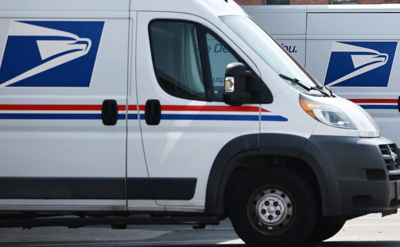 Mail trucks in a Los Angeles post office parking lot