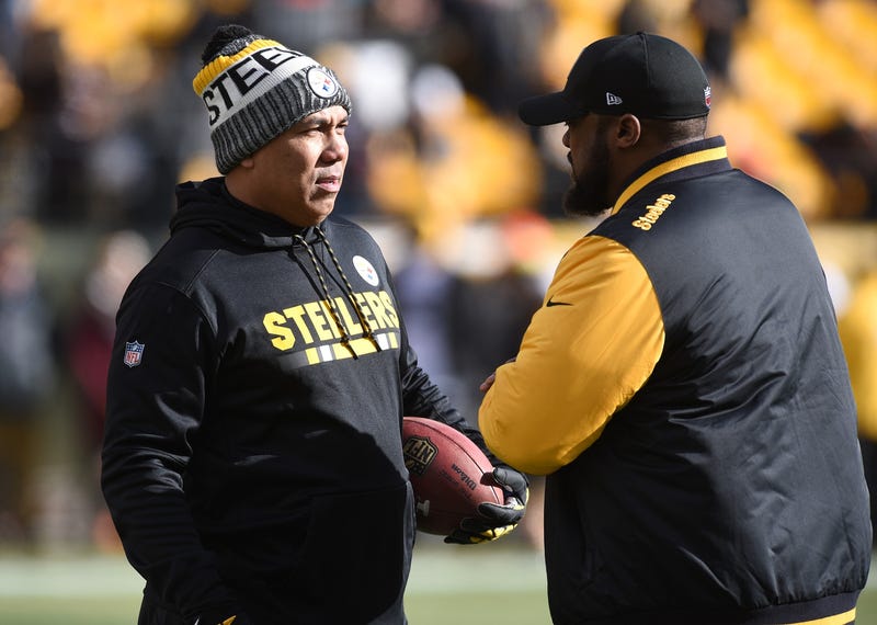 Pittsburgh Steelers former wide receiver Hines Ward (left) talks with head coach Mike Tomlin prior to the AFC Divisional Playoff game