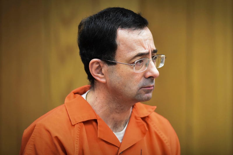 Larry Nassar listens as he is sentenced Monday, Feb. 5, 2018, in Judge Janice Cunningham's Eaton County Court. 