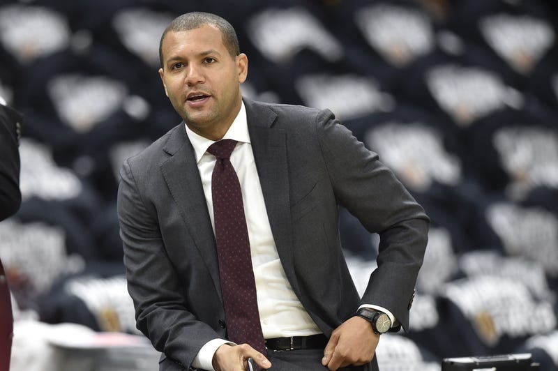 Cleveland Cavaliers general manager Koby Altman sits on the scorers table before a game against the Indiana Pacers in game one of the first round of the 2018 NBA Playoffs at Quicken Loans Arena.