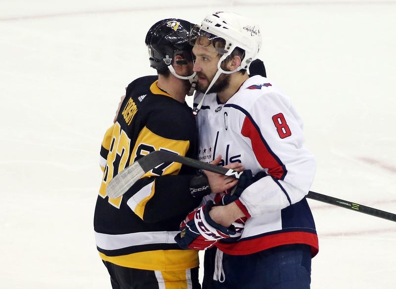 Sidney Crosby Alexander Ovechkin shaking hands after playoff series