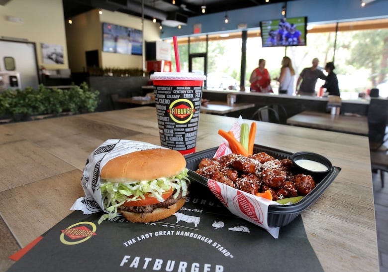 Hamburger and wings from a Fatburger restaurant