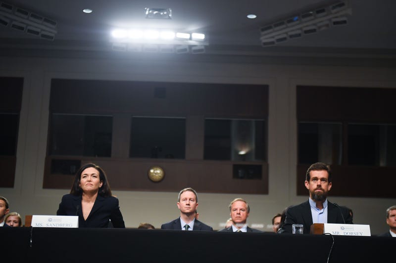 Sheryl Sandberg, chief operating officer of Facebook Inc., and Jack Dorsey, chief executive officer of Twitter Inc., testify before the Senate Select Committee on Intelligence during a hearing on Foreign Influence Operations Use of Social Media Platforms on Sept. 5, 2018 in Washington.