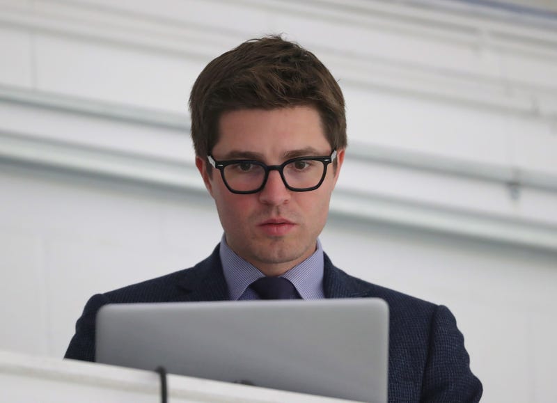 Toronto Maple Leafs general manager Kyle Dubas on his laptop