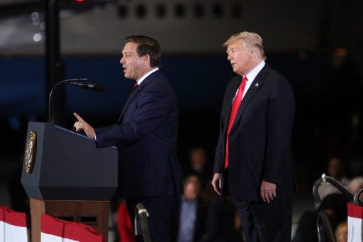 Gov. Ron DeSantis and Donald Trump