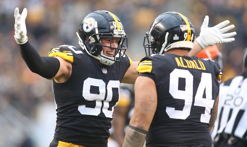 Pittsburgh Steelers linebacker T.J. Watt (90) celebrates his sack with defensive end Tyson Alualu (94)