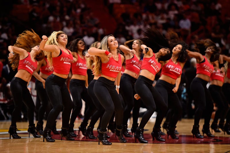 Miami Heat dancers perform during the first half between the Miami Heat and the San Antonio Spurs at American Airlines Arena.