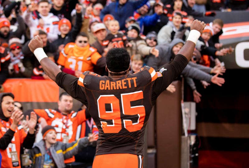 Cleveland Browns defensive end Myles Garrett (95) celebrates the team's win against the Atlanta Falcons on his way to the locker room after the game at FirstEnergy Stadium